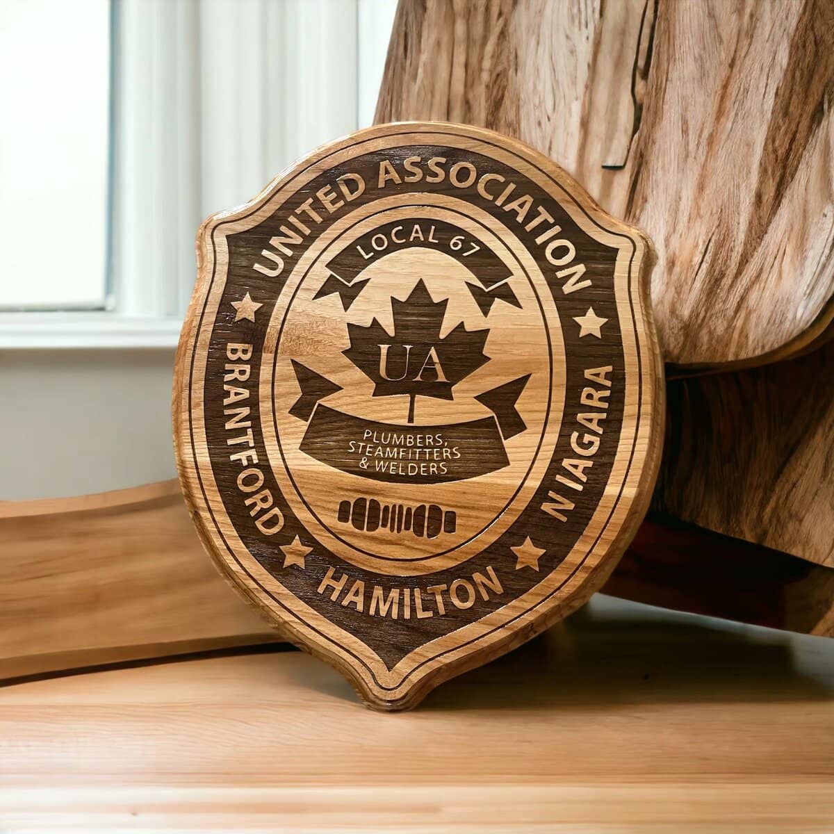 Engraved wooden plaque for United Association Local 67